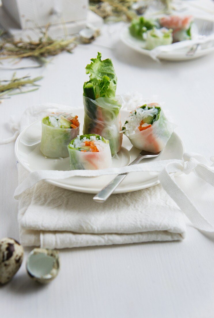 Rice paper rolls filled with spring vegetables and prawns