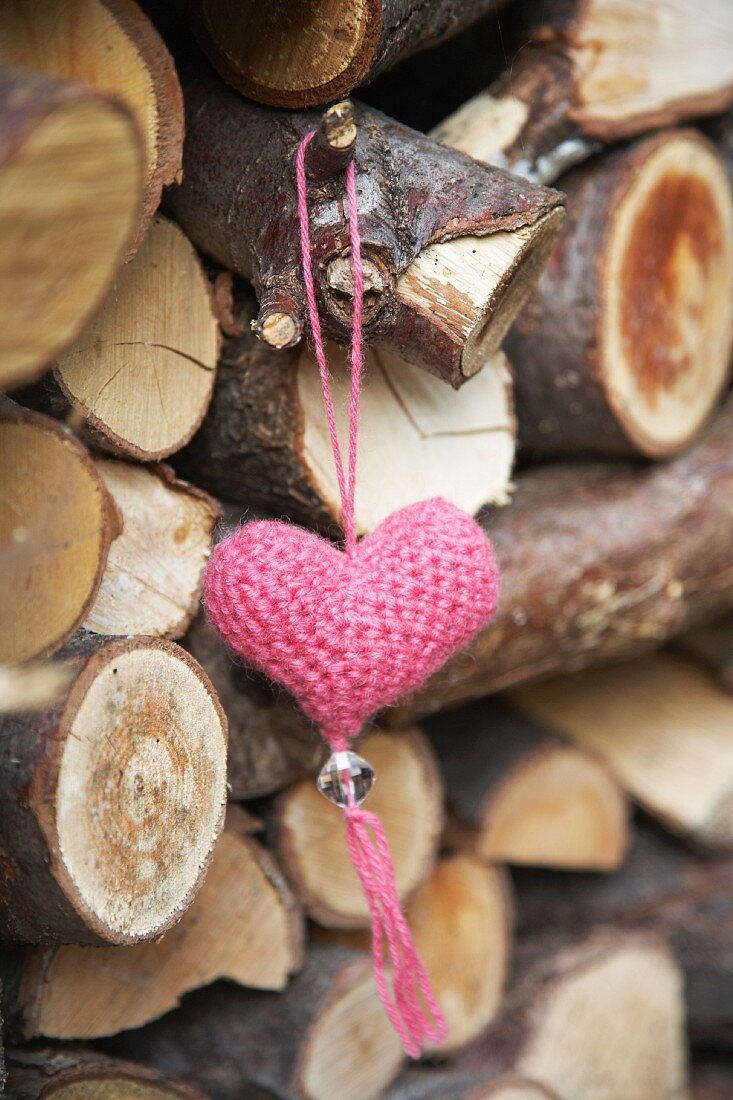 Red, hand-knitted yarn heart