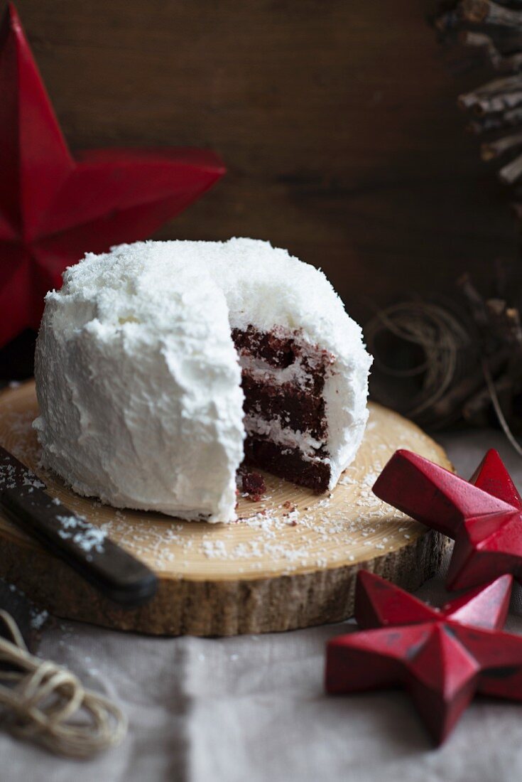 Red Velvet cake with coconut, cut to reveal the centre (for Christmas)