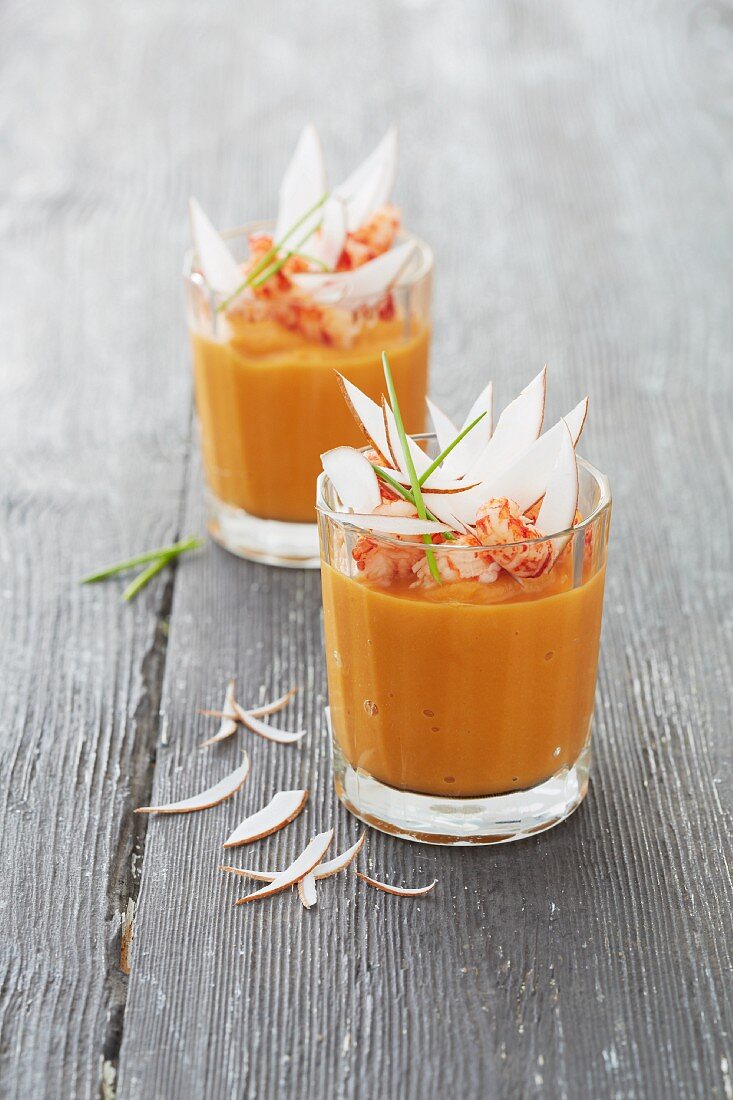 Creamy squash soup with prawns and coconut