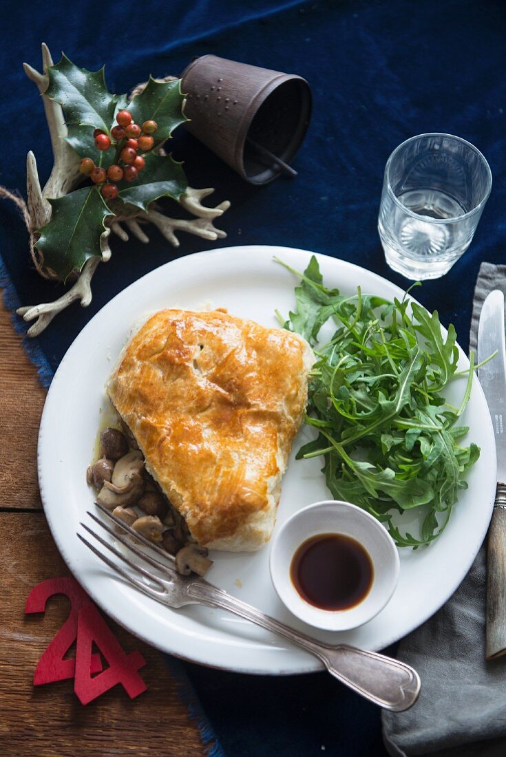 Puff pastry slice filled with mushrooms, for Christmas