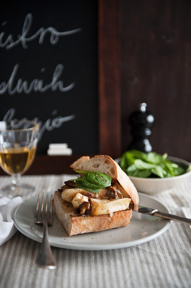 A mushroom and basil sandwich