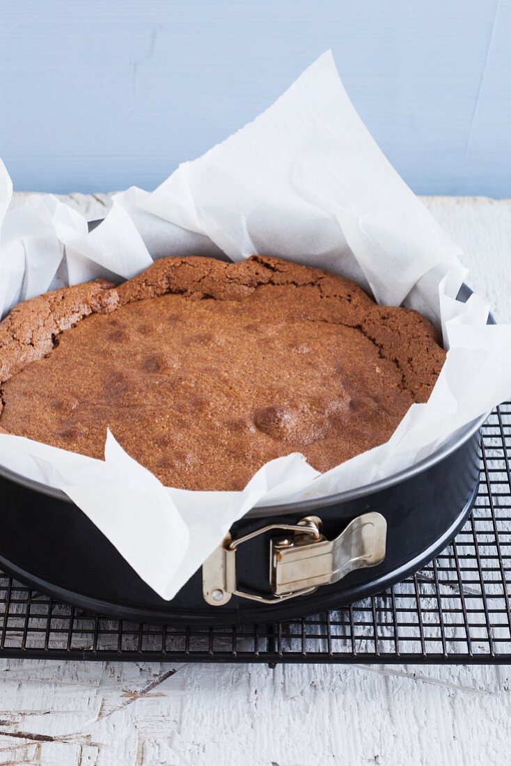 A Flourless Chocolate Cake on a Cooling Rack