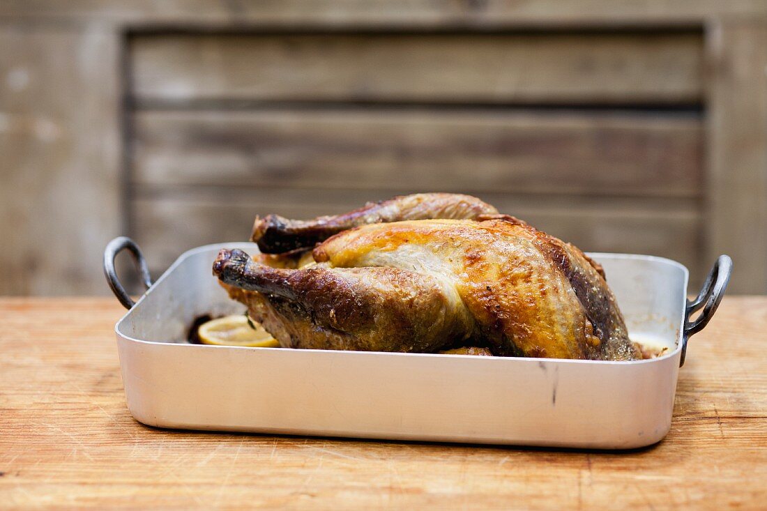 Roast chicken in a roasting tin