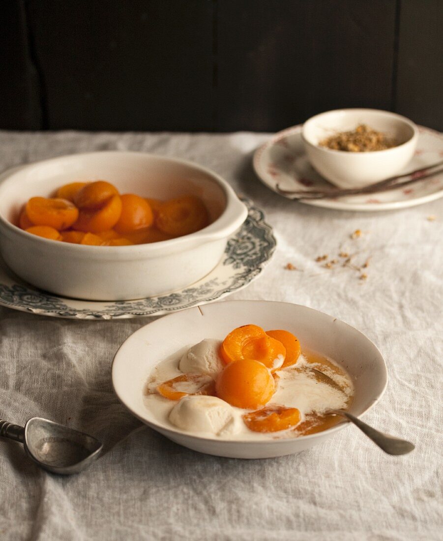 Poached apricots with ice cream