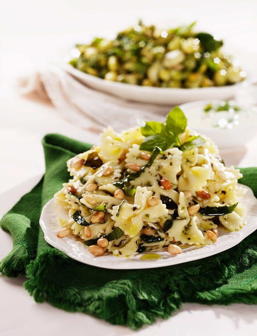 Pasta salad with pine nuts and basil