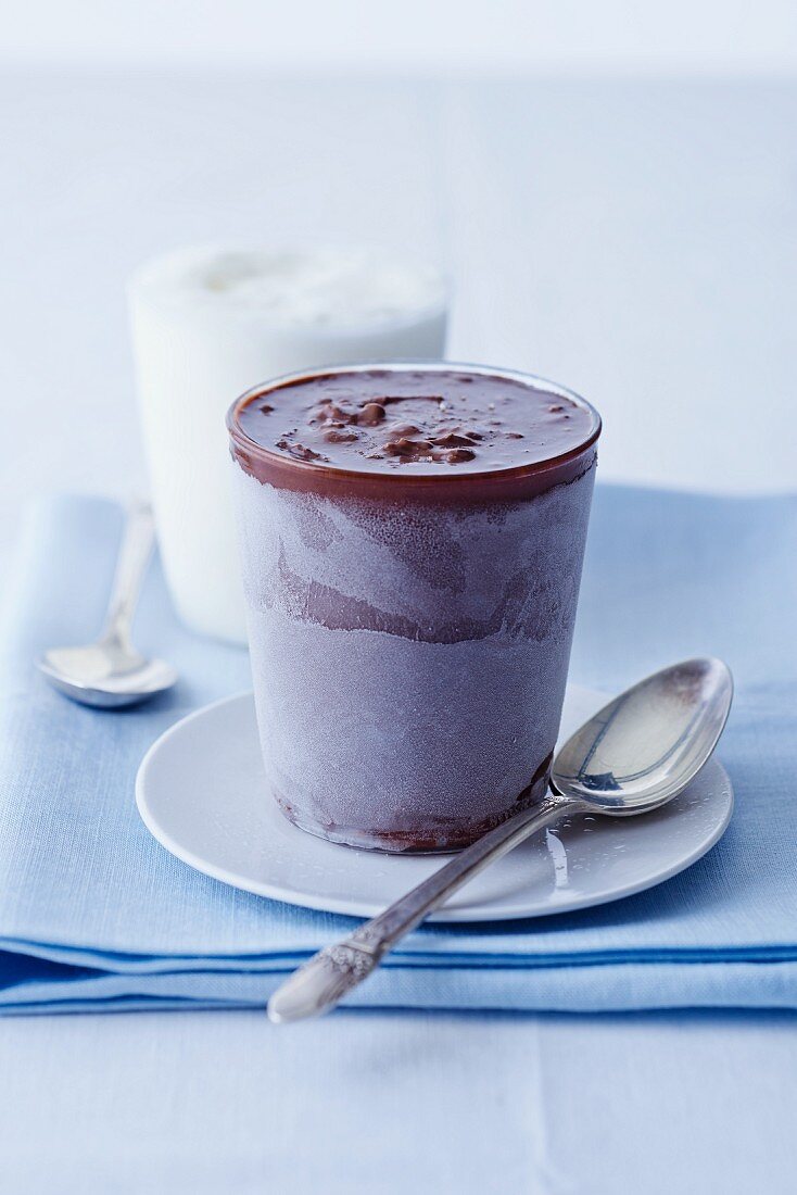 Chocolate ice cream and coconut ice cream in a glass