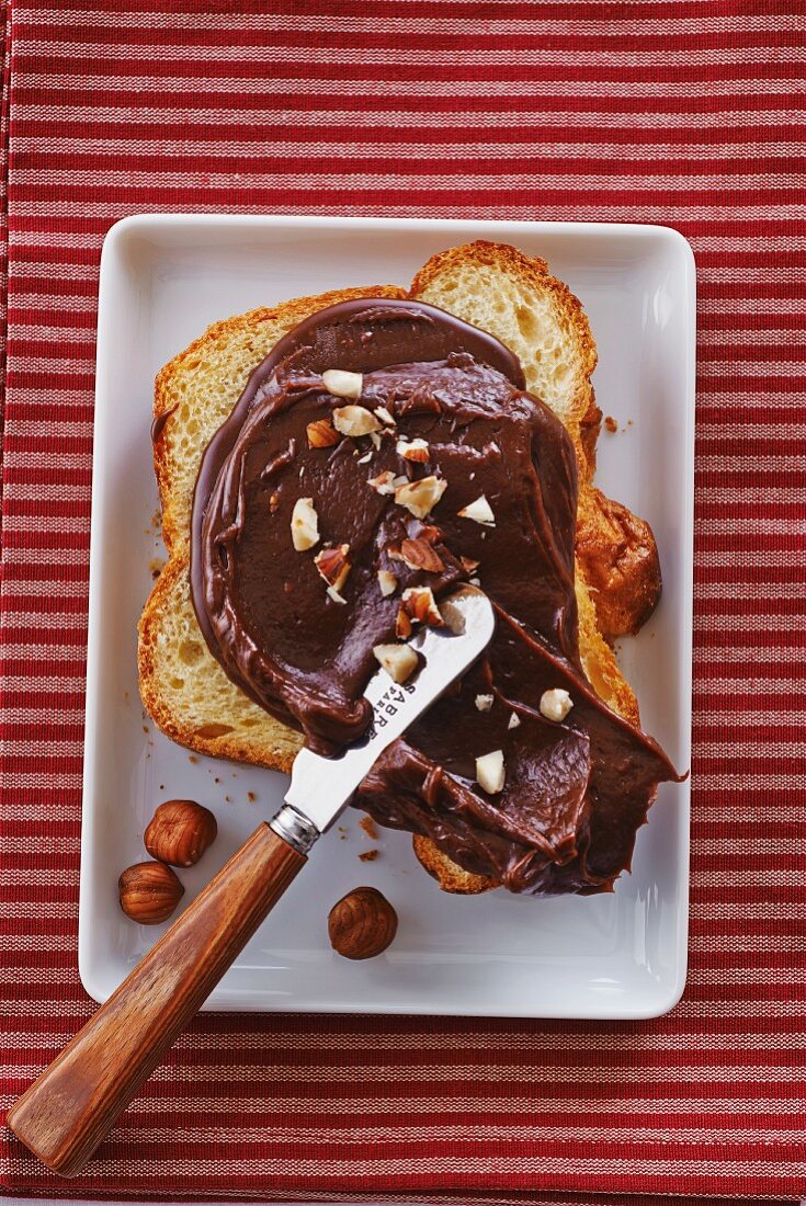 Brioche with chocolate spread and hazelnuts