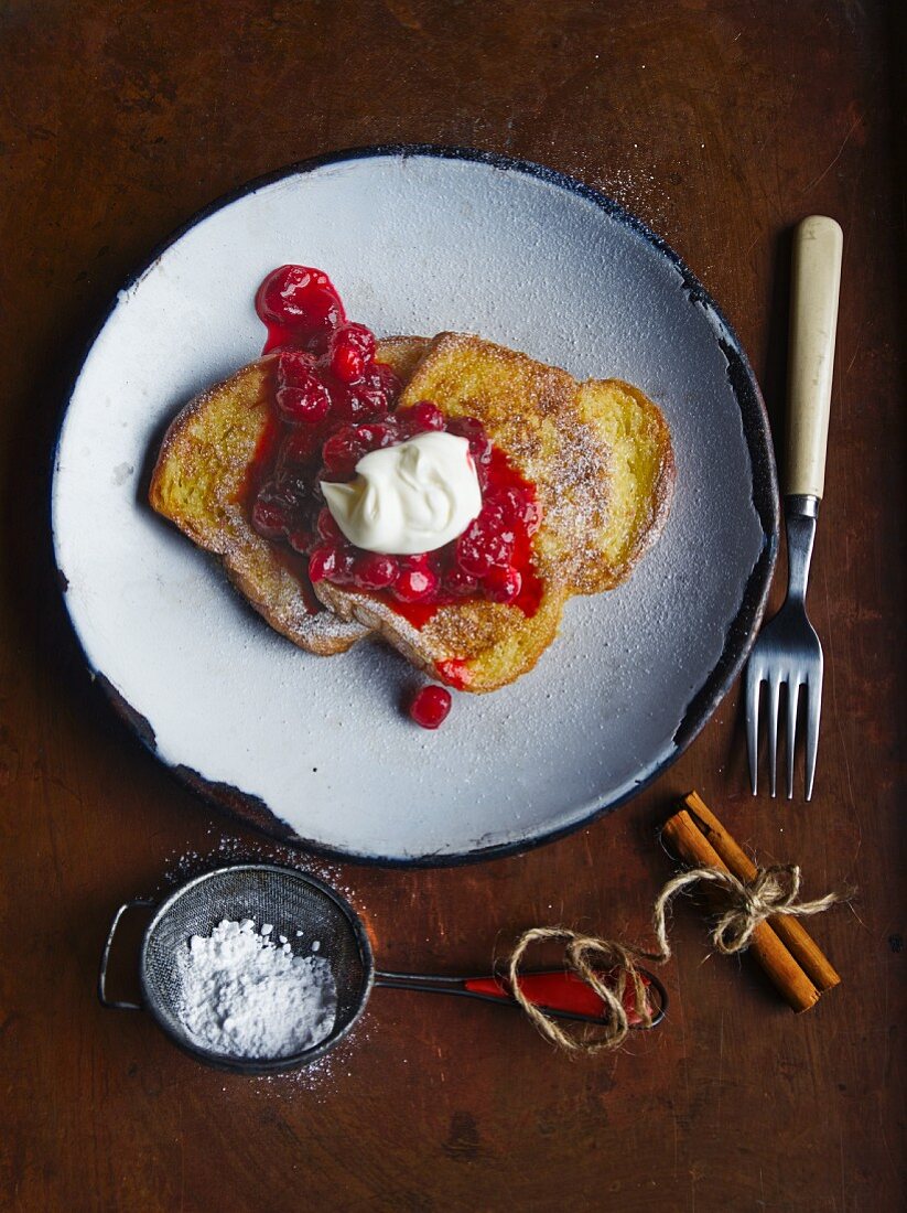 French toast with berry sauce and cream