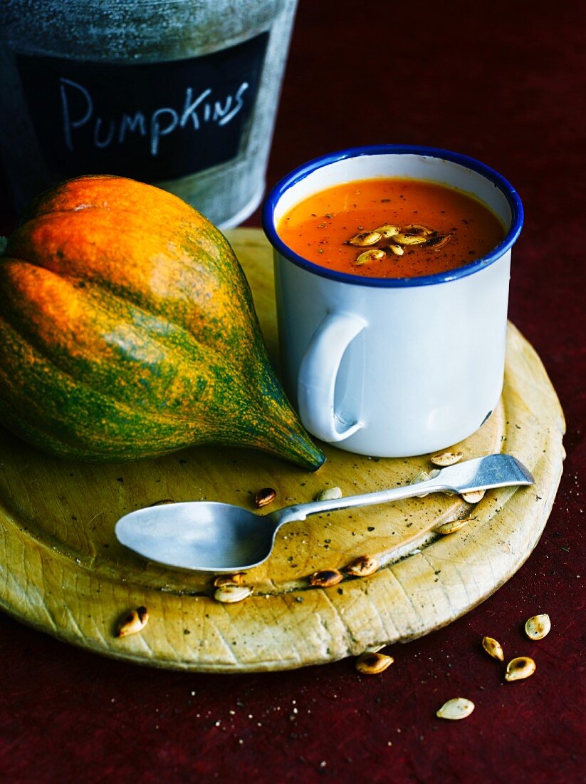 Squash soup with toasted pumpkin seeds
