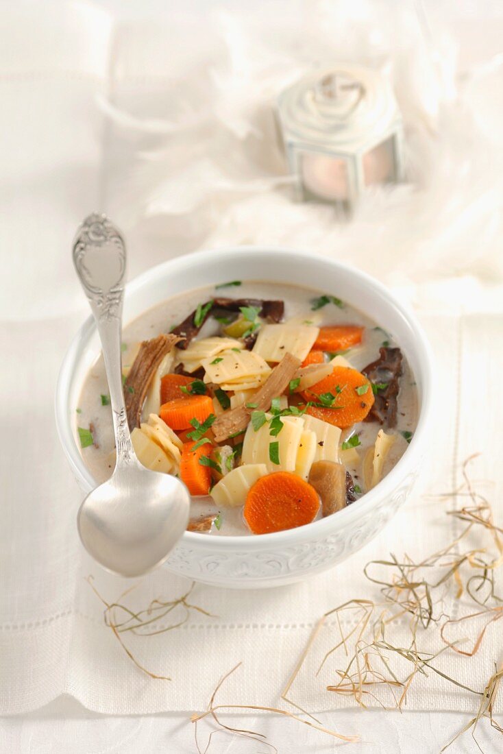 Christmas soup with dried mushrooms and quadratini pasta