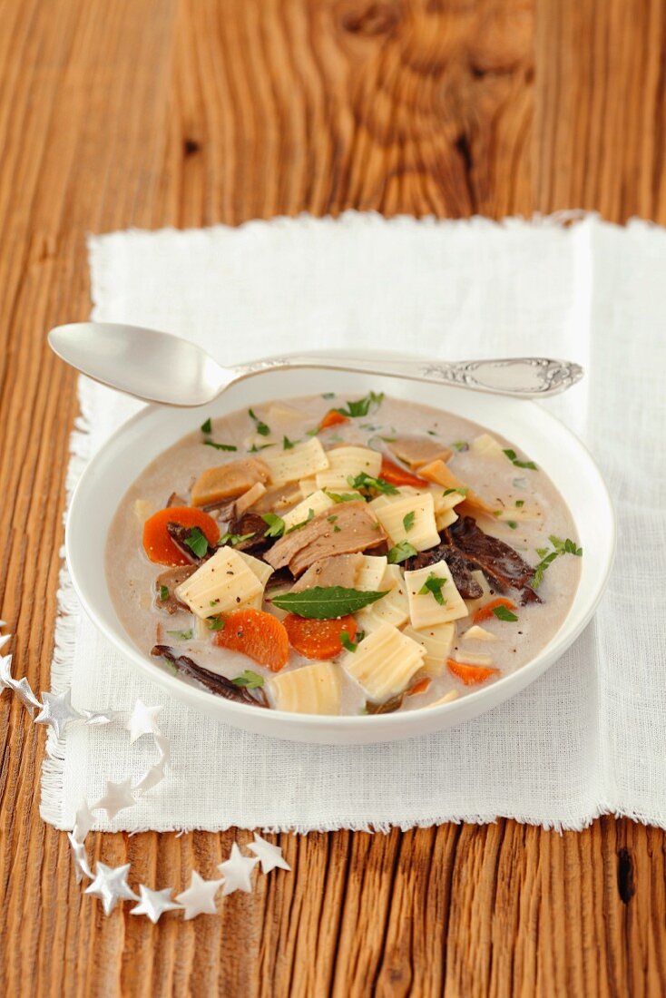 Christmas soup with dried mushrooms and quadratini pasta