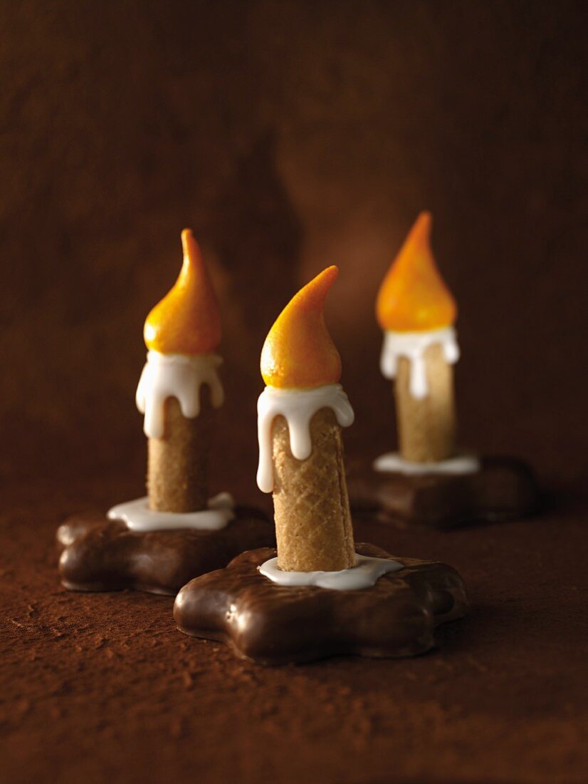 Candle biscuits (wafer rolls on chocolate-coated gingerbread)