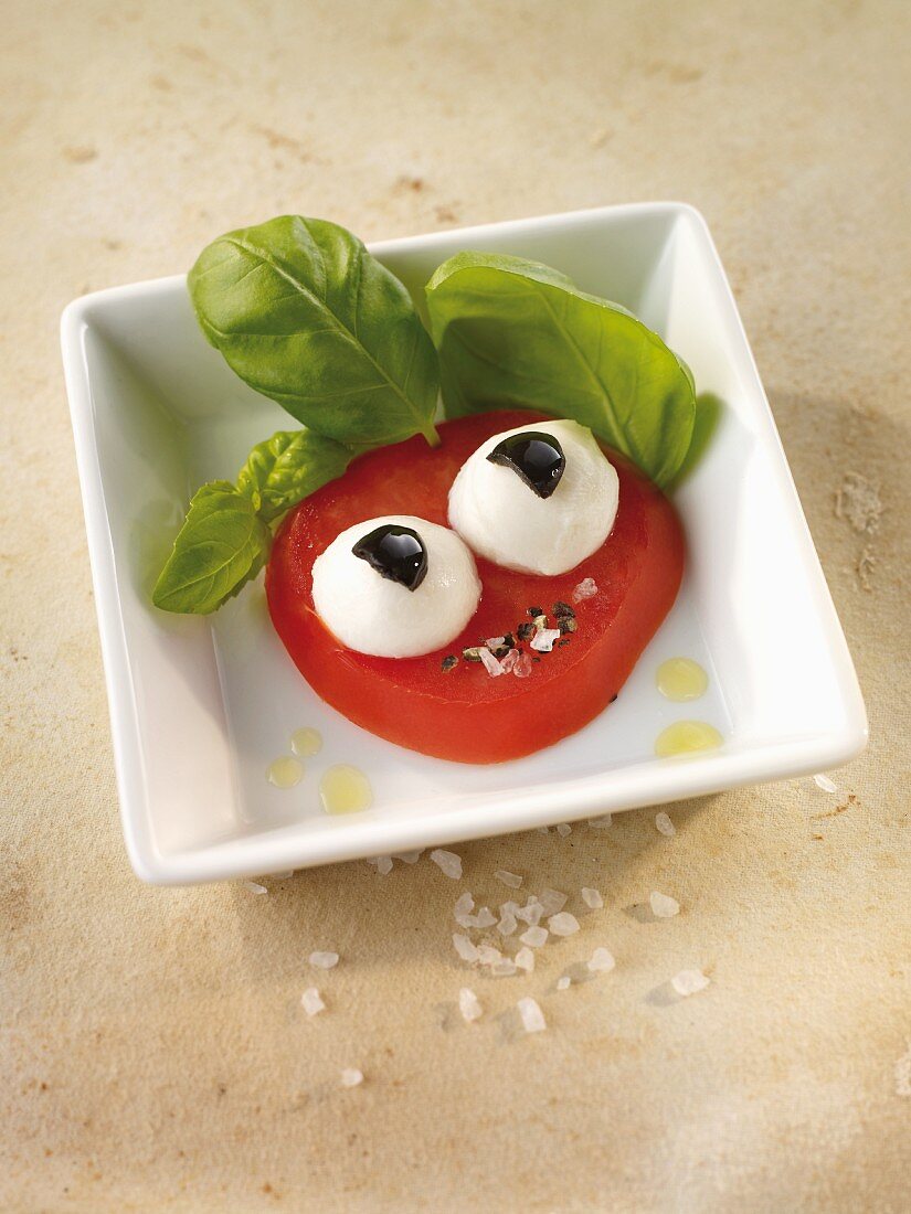 Caprese mit Mozzarella-Kulleraugen