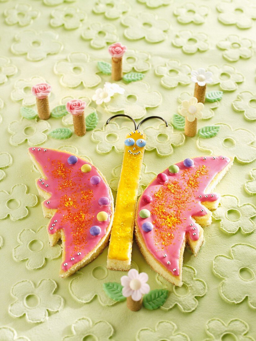 Butterfly cake and rolled wafer flowers