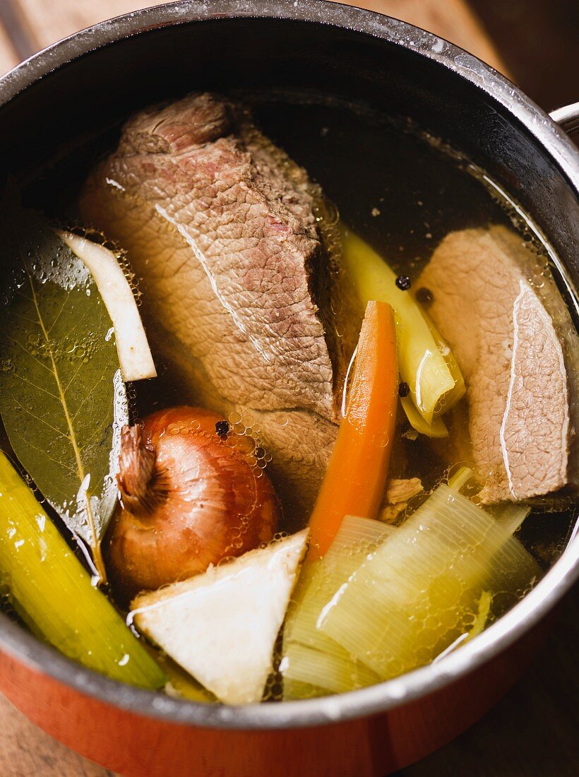 Beef broth in a saucepan
