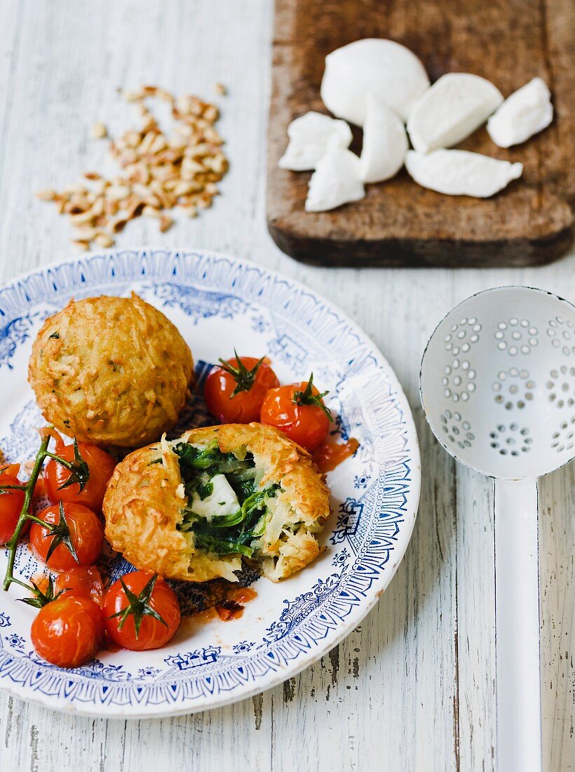 Spinach dumplings with roasted cherry tomatoes and mozzarella