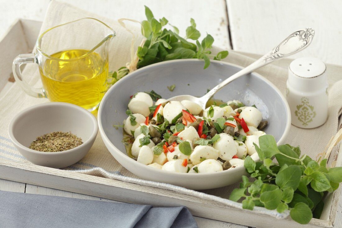 Mozzarella salad with oregano, capers and chilli