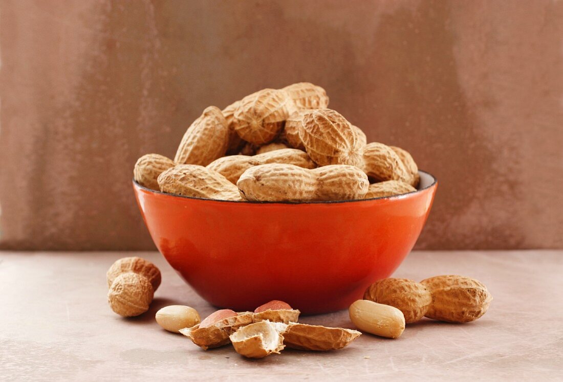Peanuts in a red bowl