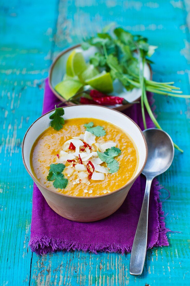 Squash soup with coconut, chilli rings and coriander (Asia)