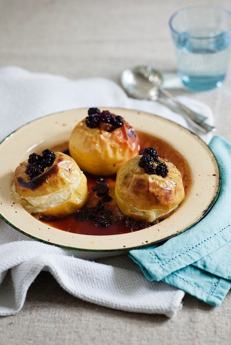 Baked apples with blackberry filling