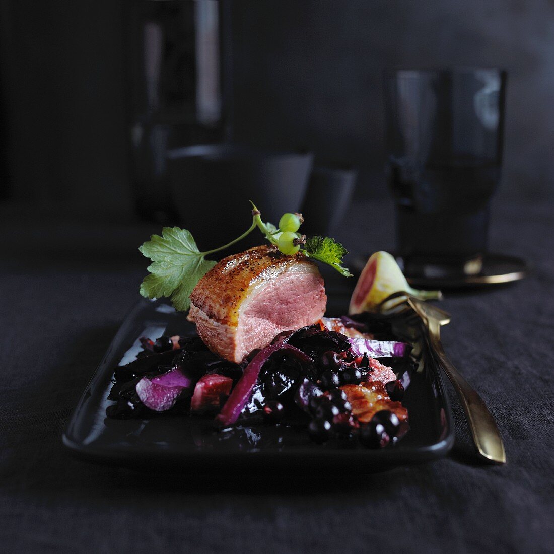 Duck breast with red cabbage and blackcurrants