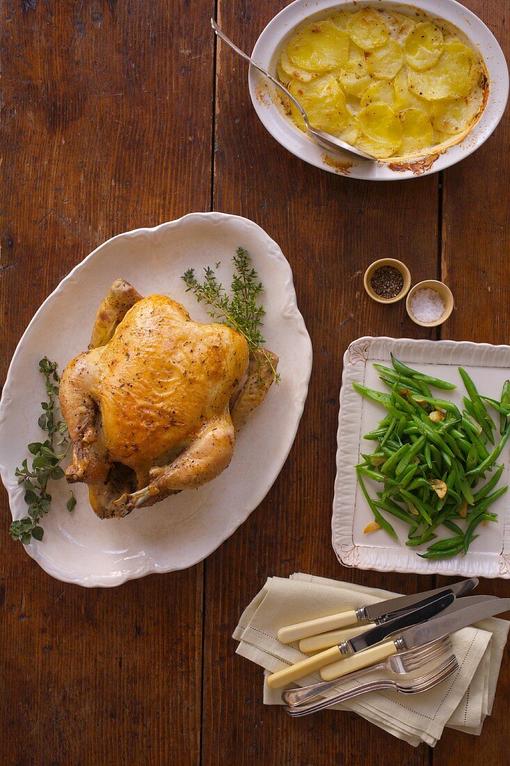 A Roasted Chicken, Green Beans, and Potato Gratin
