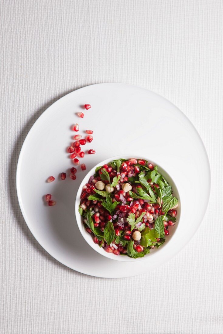 Pomegranate salad with herbs and hazelnuts