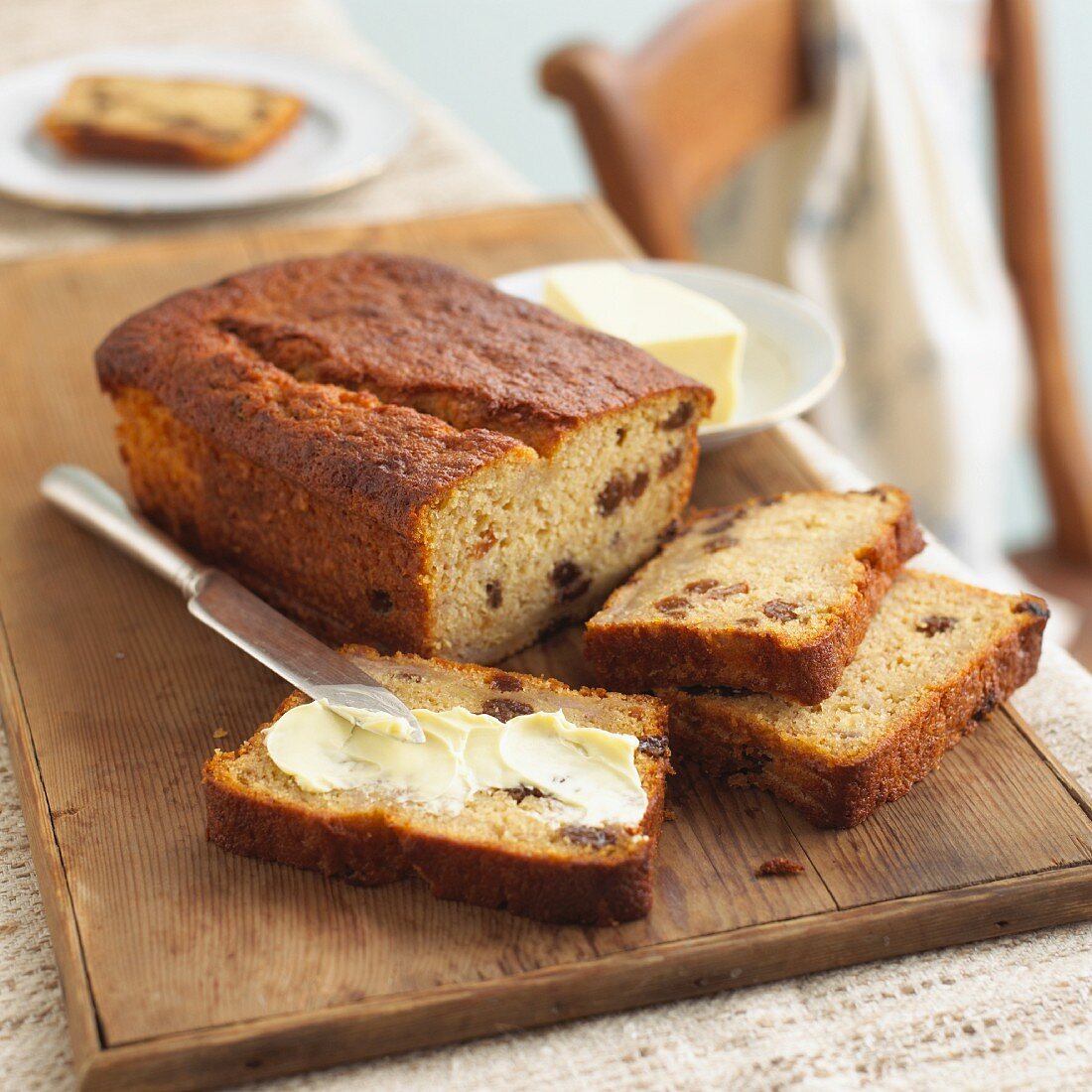 Fruit bread with raisins and butter