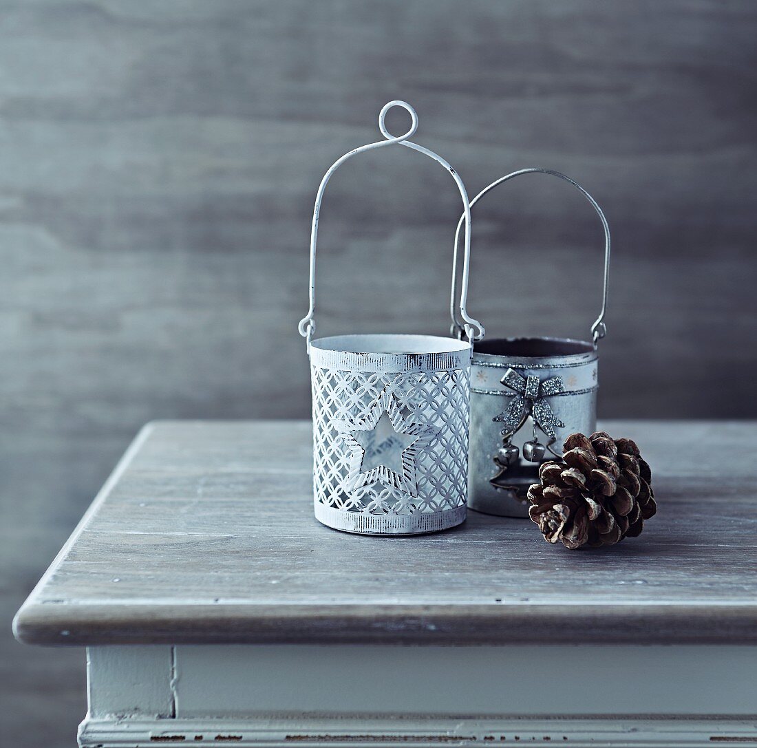 Old fashion christmas lanterns and a cone