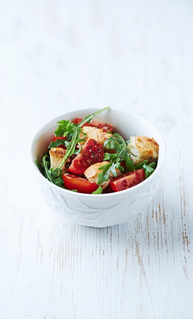 cherry tomatoes with arugula and roasted bread