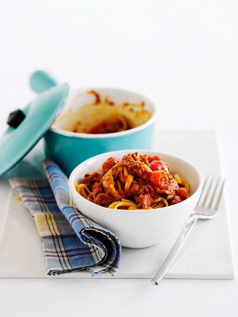 Noodles with ground beef sauce and tomatoes