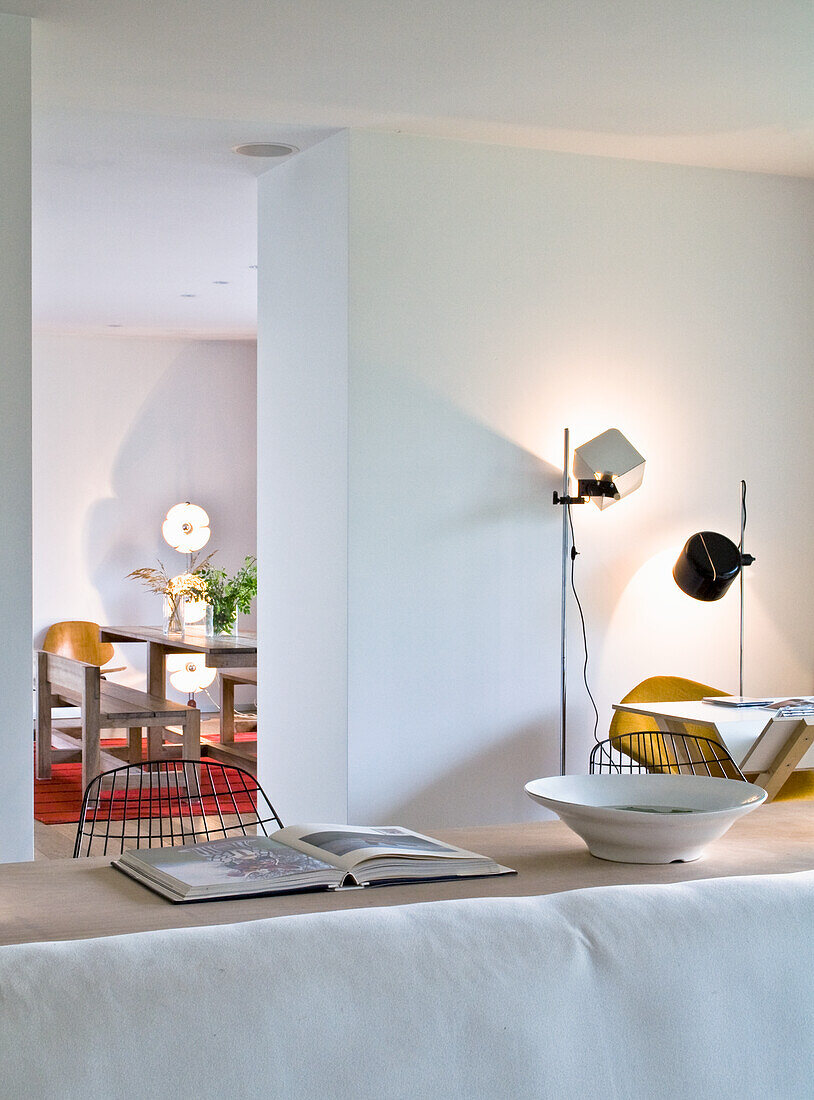 Minimalist room with white wall color and view of dining table