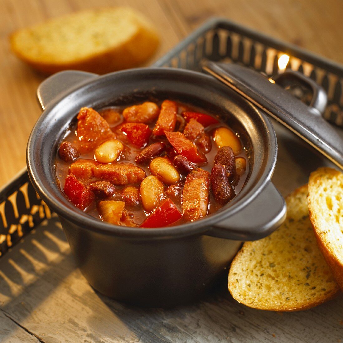 Goulash with beans and peppers in a stew pot for Halloween