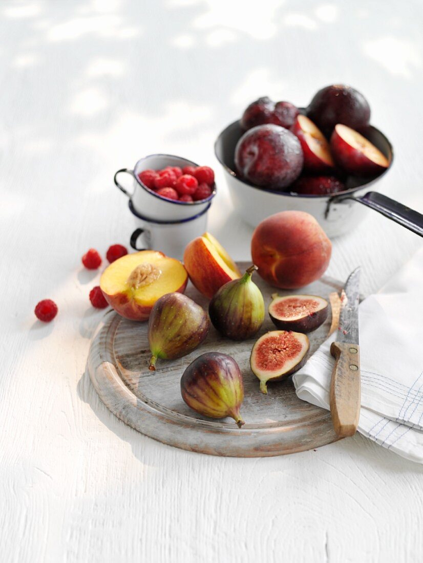 Fresh figs, peaches, plums and raspberries