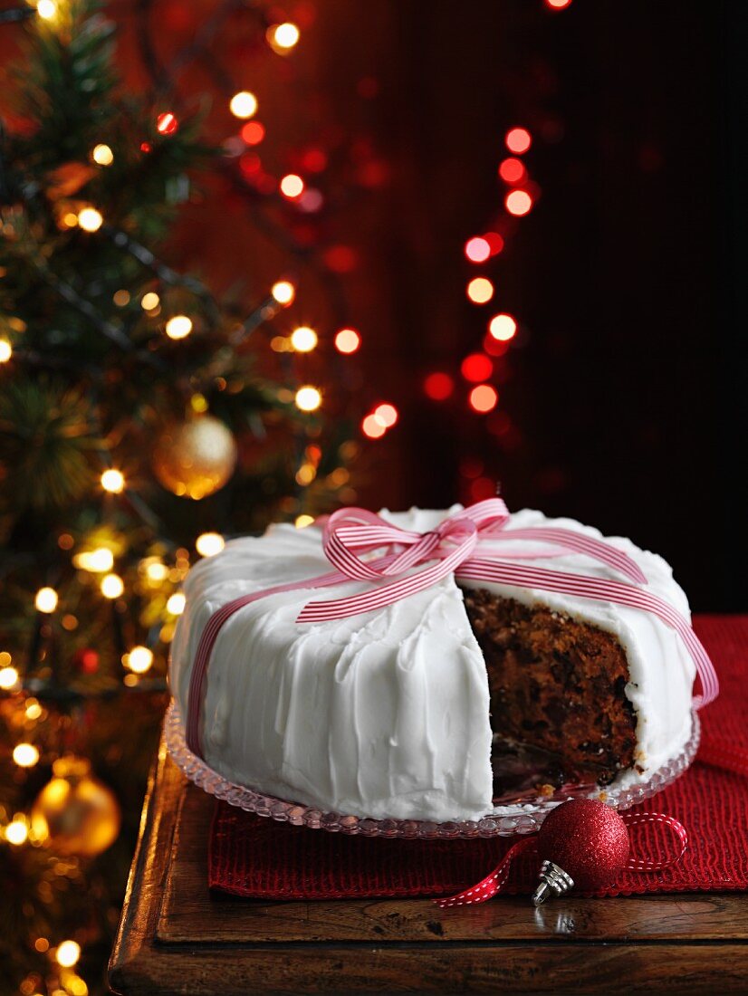 Christmas cake with a slice taken out