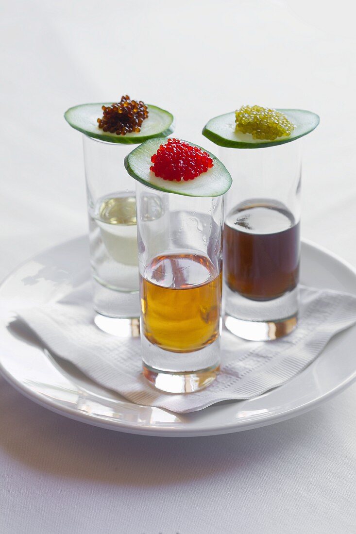 Trio of shots with assorted caviar top