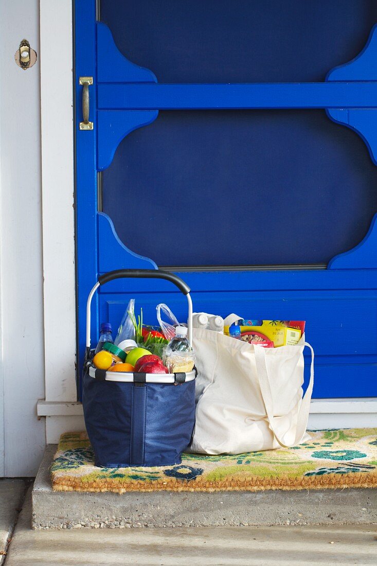 Baskets of Groceries on Front Step at the Door