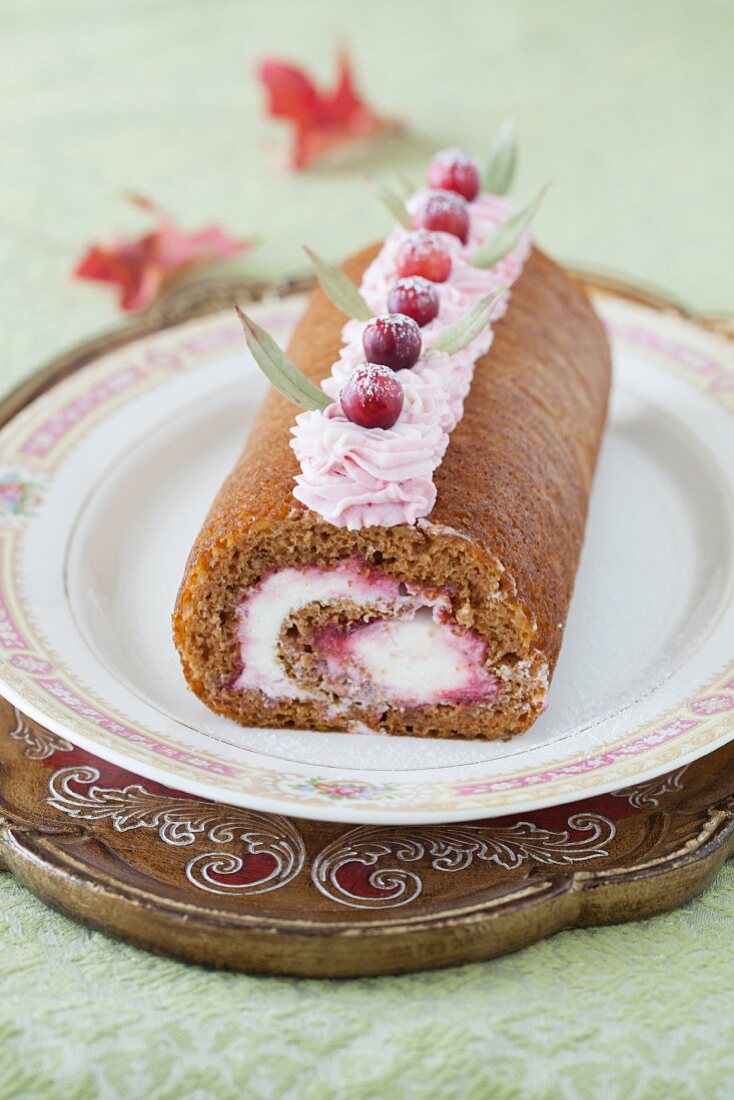 Rolled Pumpkin Spice Cake with Cranberry Jam, Grand Marnier Syrup & Cream Cheese Filling