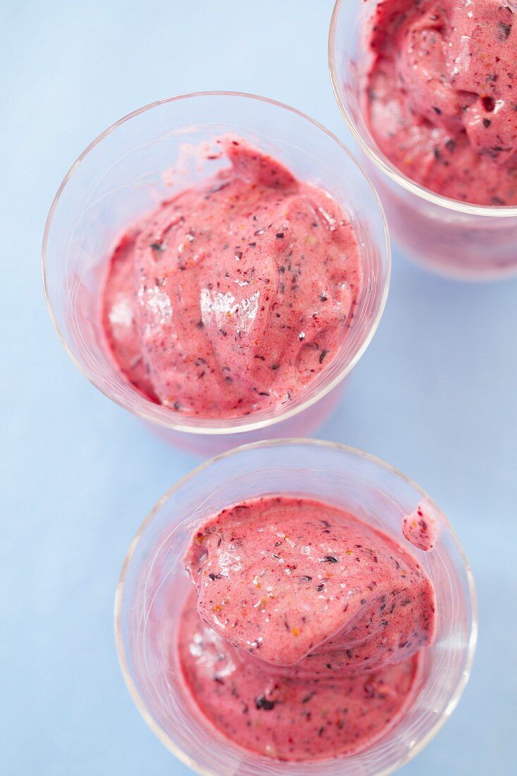 Home-made raspberry ice cream in three glasses
