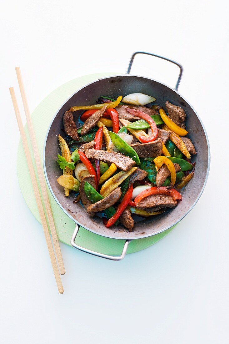 Beef fillet with colourful vegetables cooked in the wok