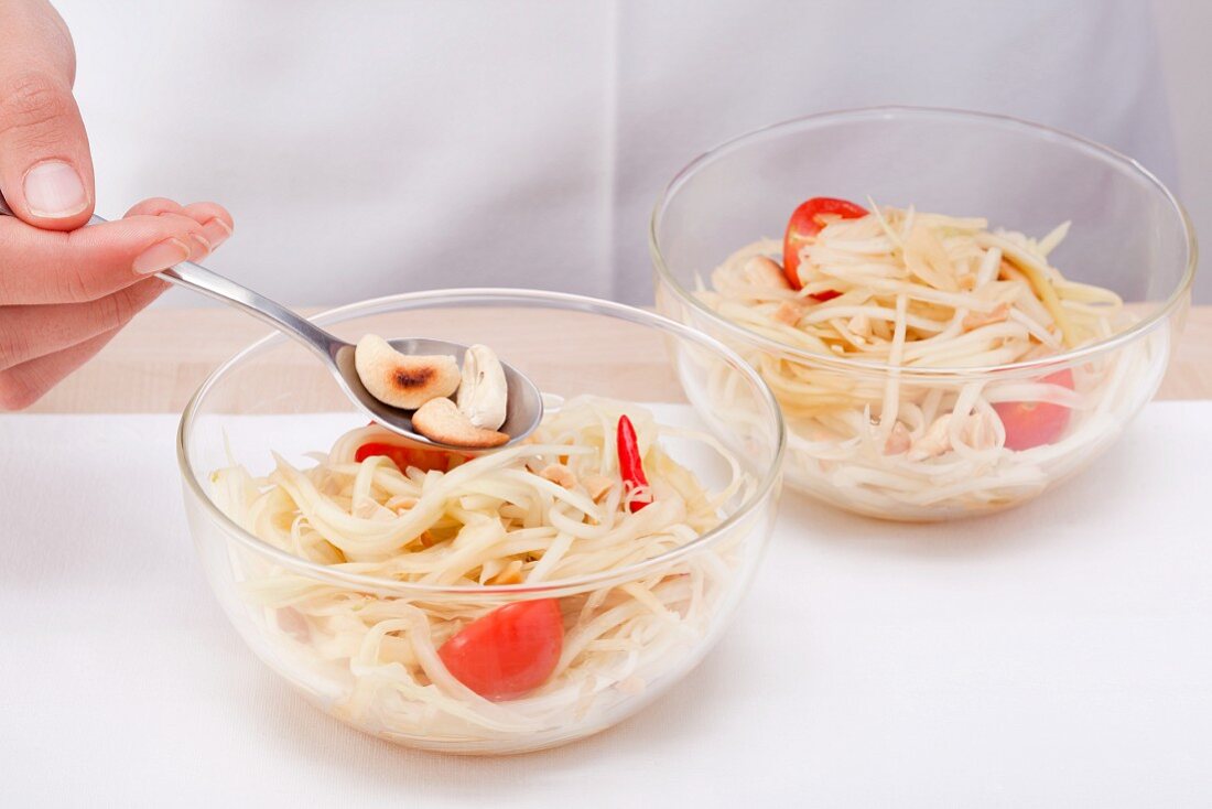 Thai papaya salad with cashew nuts