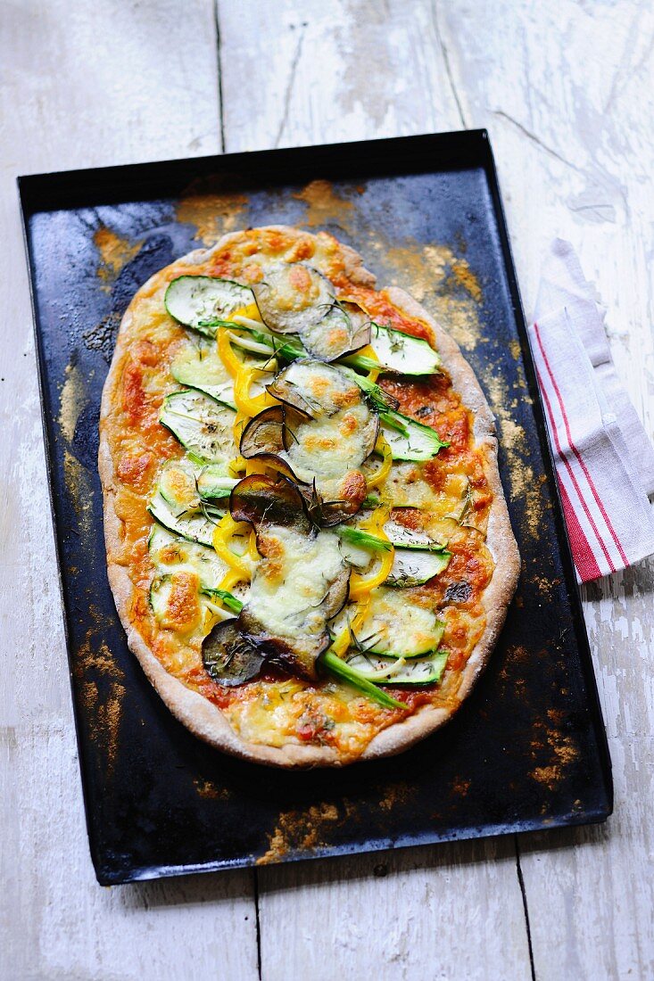 Vegetable pizza with courgette, aubergines and peppers