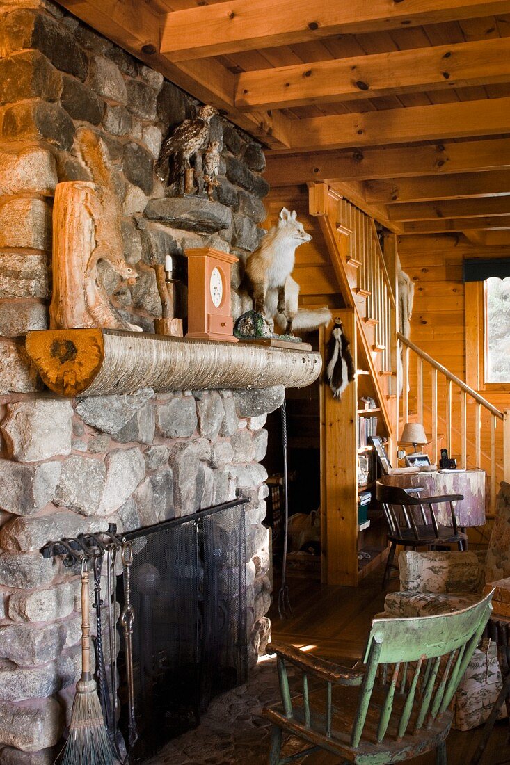 The interior of an Adirondacks cabin in Newcomb, NY with antique furniture and family heirlooms