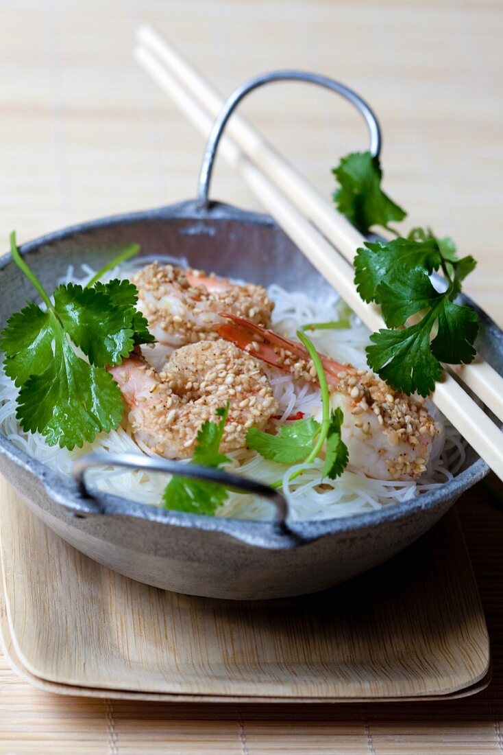 Rice noodles with sesame prawns and coriander (Asia)