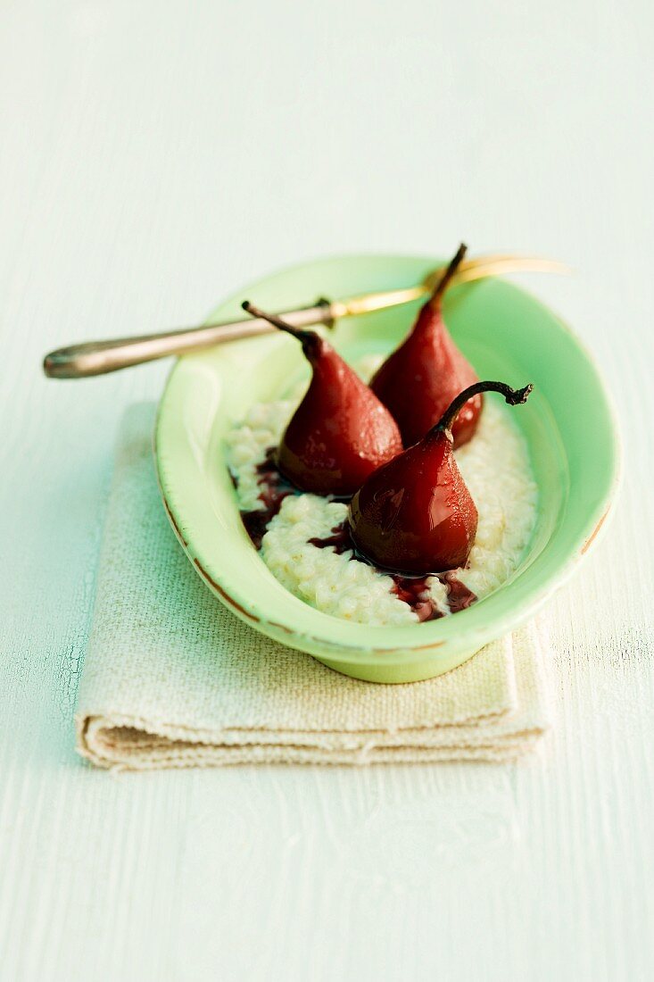 Cinnamon risotto with pears poached in red wine