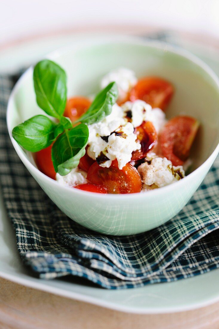 Tomato salad with goat's cheese quark and pumpkin seed oil