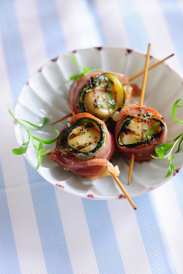 Scallops wrapped in bacon