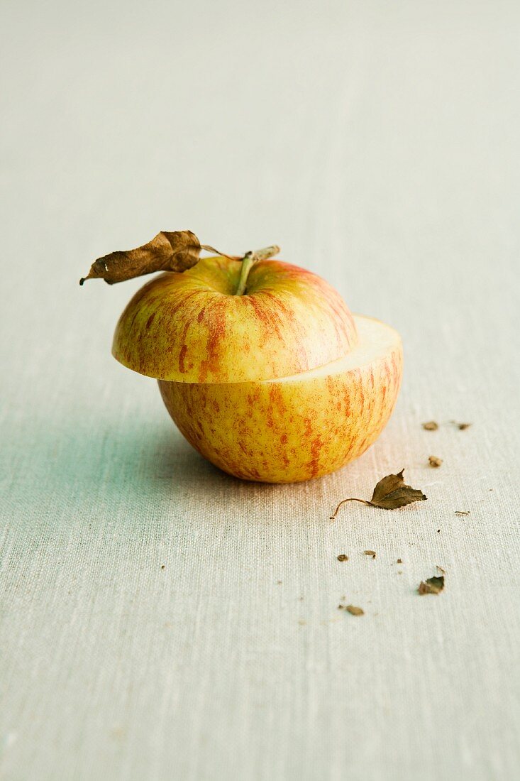 A Cox's Orange apple, sliced through the middle