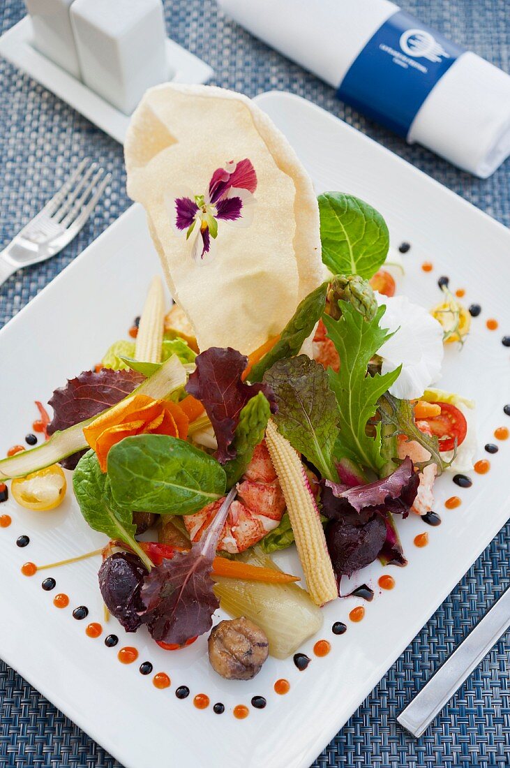 Lobster and prawns with lettuce leaves